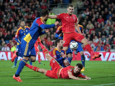 131015 - Wales v Andorra - UEFA European Championship Qualifiers - Ben Davies and Sam Vokes of Wales try to get the ball past Gabriel Riera of Andorra