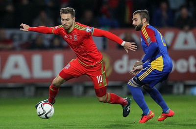 131015 - Wales v Andorra - UEFA European Championship Qualifiers - Aaron Ramsey of Wales is challenged by Jordi Rubio of Andorra