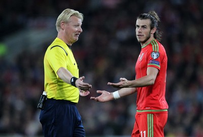 131015 - Wales v Andorra - UEFA European Championship Qualifiers - Gareth Bale of Wales reasons with Referee Kevin Blom