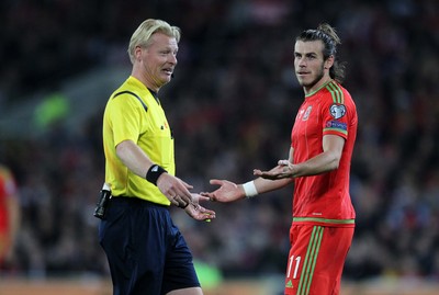 131015 - Wales v Andorra - UEFA European Championship Qualifiers - Gareth Bale of Wales reasons with Referee Kevin Blom