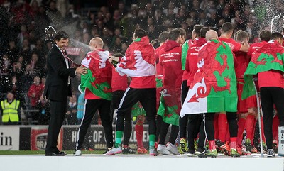 131015 - Wales v Andorra - UEFA European Championship Qualifiers - Wales Manager Chris Coleman gets sprayed with champagne