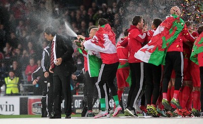 131015 - Wales v Andorra - UEFA European Championship Qualifiers - Wales Manager Chris Coleman gets sprayed with champagne