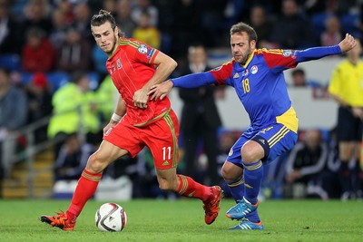131015 - Wales v Andorra - UEFA European Championship Qualifiers - Gareth Bale of Wales is challenged by Josep Ayala of Andorra