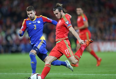 131015 - Wales v Andorra, UEFA European Championship Qualifier - Gareth Bale of Wales shoots at goal as Moises San Nicolas of Andorra challenges
