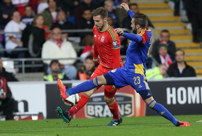 131015 - Wales v Andorra, UEFA European Championship Qualifier - Aaron Ramsey of Wales is challenged by Jordi Rubio of Andorra