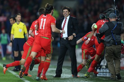 131015 - Wales v Andorra, UEFA European Championship Qualifier - Wales manager Chris Coleman celebrates with his players after Aaron Ramsey of Wales scores goal