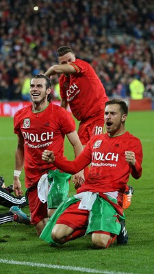 131015 - Wales v Andorra, UEFA European Championship Qualifier - Aaron Ramsey of Wales and Gareth Bale of Wales lead the celebrations at the end of the match