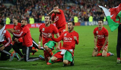 131015 - Wales v Andorra, UEFA European Championship Qualifier - Aaron Ramsey of Wales and Gareth Bale of Wales lead the celebrations at the end of the match