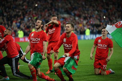 131015 - Wales v Andorra, UEFA European Championship Qualifier - Aaron Ramsey of Wales and Gareth Bale of Wales lead the celebrations at the end of the match