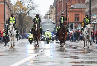 091125 - Wales v Argentina, Quilter Nations Series - South Wales Police Mounted Section escort the Wales team coach to the Principality Stadium