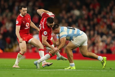 091125 - Wales v Argentina, Quilter Nations Series - Josh Adams of Wales takes on Santiago Carreras of Argentina