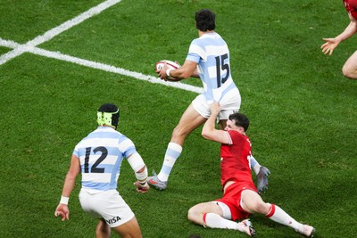 091125 - Wales v Argentina - Quilter Nations Series - Santiago Carreras of Argentina is tackled by Tom Rogers of Wales