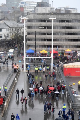 091125 - Wales v Argentina - Quilter Nations Series - Wales fans walk down Westgate Street in Cardiff in the rain ahead of the match