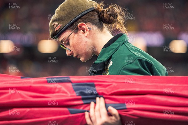 091125 - Wales v Argentina - Quilter Nations Series - A cadet caries a flag ahead of the game 