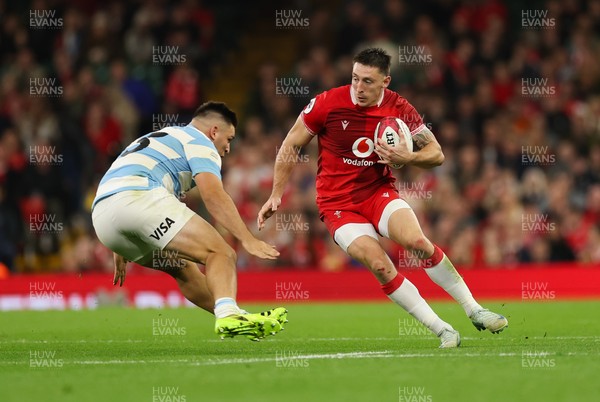 091125 - Wales v Argentina, Quilter Nations Series - Josh Adams of Wales takes on Santiago Carreras of Argentina