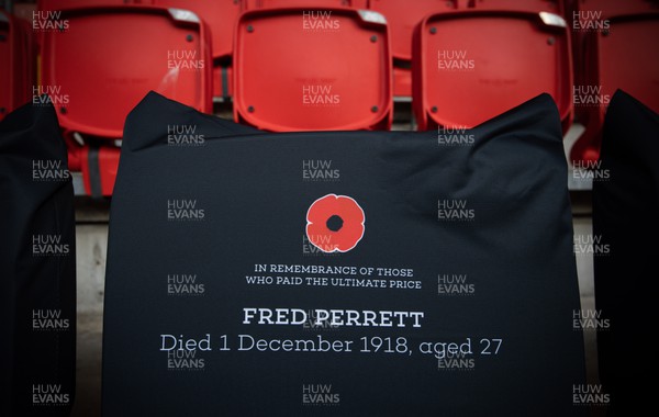 121122 - Wales v Argentina, Autumn Nations Series - A Remembrance seat cover in Remembrance of Fred Perrett in place at the Principality Stadium