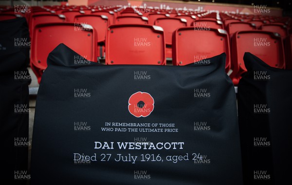 121122 - Wales v Argentina, Autumn Nations Series - A Remembrance seat cover in Remembrance of Dai Westacott in place at the Principality Stadium