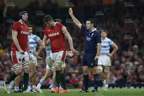 121122 - Wales v Argentina - Autumn Nations Series - Referee Ben O'Keeffe shows a yellow card to Will Rowlands of Wales