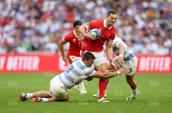 141023 - Wales v Argentina - Rugby World Cup Quarter Final - George North of Wales is tackled by Facundo Isa of Argentina 