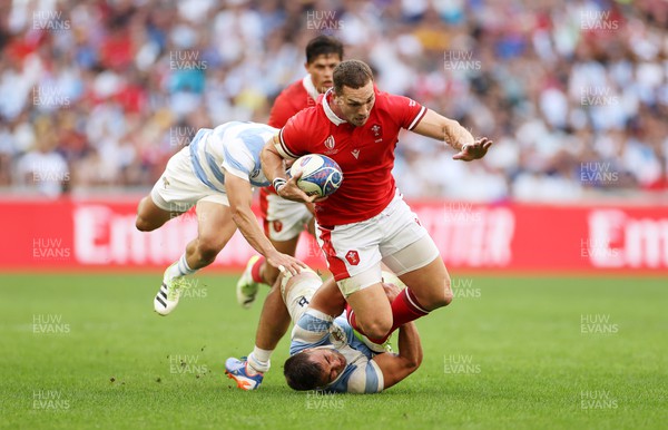 141023 - Wales v Argentina - Rugby World Cup Quarter Final - George North of Wales is tackled by Facundo Isa of Argentina 