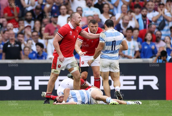 141023 - Wales v Argentina - Rugby World Cup Quarter Final - Josh Adams of Wales is pushed by Mateo Carreras of Argentina 