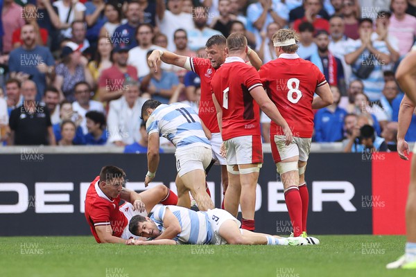 141023 - Wales v Argentina - Rugby World Cup Quarter Final - Josh Adams of Wales is pushed by Mateo Carreras of Argentina 