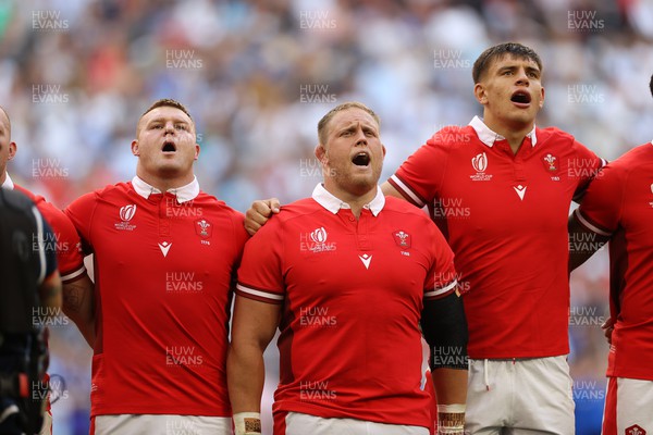 141023 - Wales v Argentina - Rugby World Cup Quarter Final - Dewi Lake, Corey Domachowski and Dafydd Jenkins of Wales sing the anthem