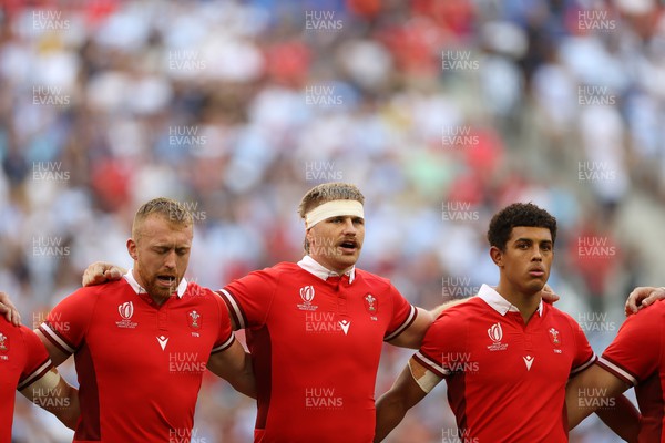 141023 - Wales v Argentina - Rugby World Cup Quarter Final - Tommy Reffell, Aaron Wainwright and Rio Dyer of Wales sing the anthem