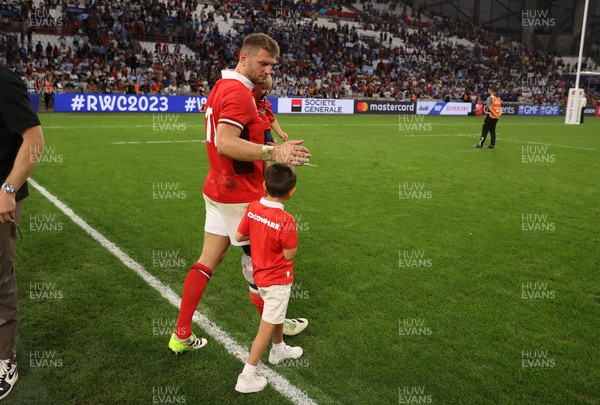141023 - Wales v Argentina - Rugby World Cup Quarter Final - Dan Biggar of Wales with his children at full time