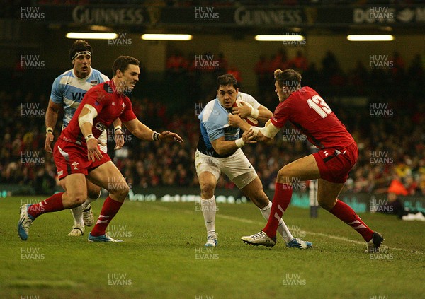 161113 - Wales v Argentina - Dove Men+Care Series - Argentina's Horacio Agulla is tackled by Wales' Cory Allen(c) Huw Evans Agency