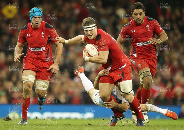 161113 - Wales v Argentina - Dove Men Series - Scott Williams of Wales is tackled by Nicolas Sanchez of Argentina 