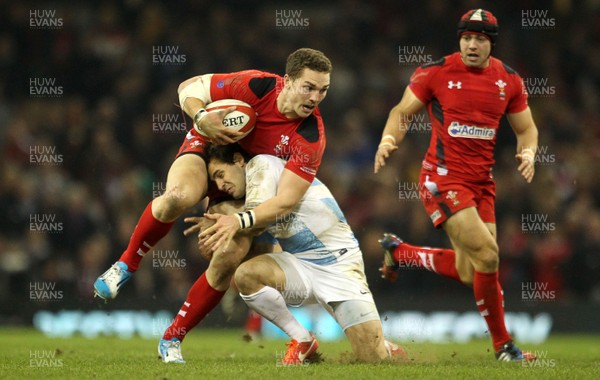 161113 - Wales v Argentina - Dove Men Series - George North of Wales is tackled by Nicolas Sanchez of Argentina 