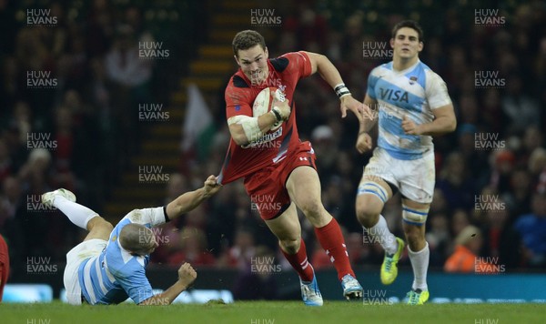 161113 - Wales v Argentina - Dove Men Series 2013 -George North of Wales is tackled by Santiago Cordero of Argentina