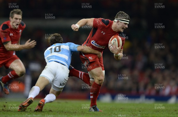 161113 - Wales v Argentina - Dove Men Series 2013 -Scott Williams of Wales is tackled by Nicolas Sanchez of Argentina