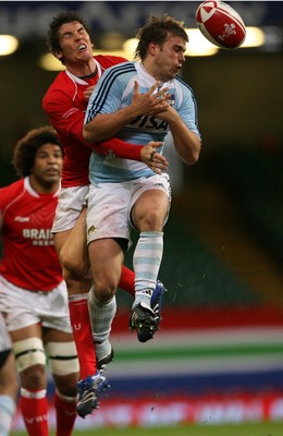 18.08.07  Wales v Argentina Wales James Hook and Federico Serra Miras compete for ball. 