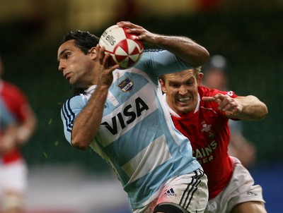 18.08.07  Wales v Argentina Wales Dafydd James tackles Martin Gaitan 
