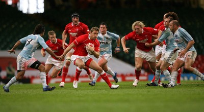 18.08.07  Wales v Argentina Wales Jamie Robinson takes on Martin Gaitan. 