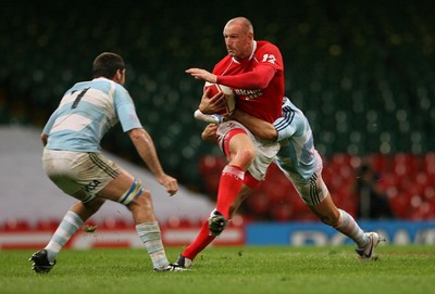 18.08.07  Wales v Argentina Wales Gareth Thomas is tackled by Federico Todeschini. 