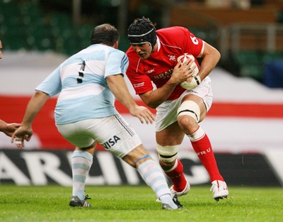 18.08.07  Wales v Argentina Wales Jonathan Thomas takes on Rodrigo Roncero. 