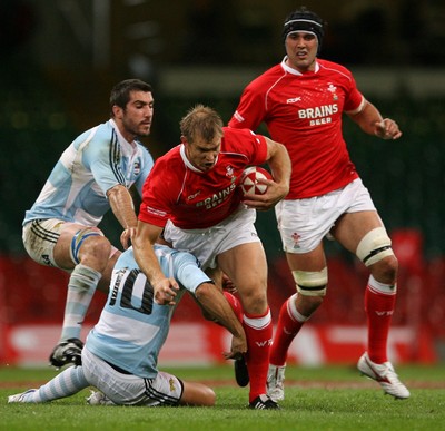 18.08.07  Wales v Argentina Wales Dafydd James is tackled by Federico Todeschini. 