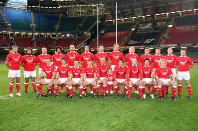 18.08.07  Wales v Argentina Six year old Rhys Harris with captain Gareth Thomas and the Wales team 
