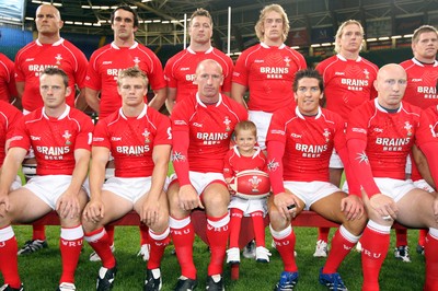 18.08.07  Wales v Argentina Six year old Rhys Harris with captain Gareth Thomas and the Wales team 