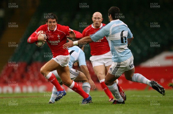 18.08.07  Wales v Argentina Wales James Hook hands off Juan Manuel Leguizamon 
