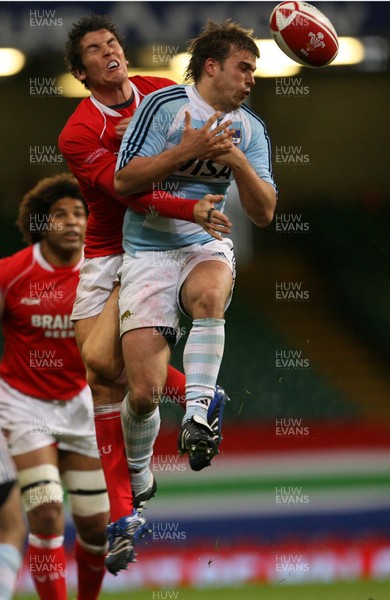 18.08.07  Wales v Argentina Wales James Hook and Federico Serra Miras compete for ball. 