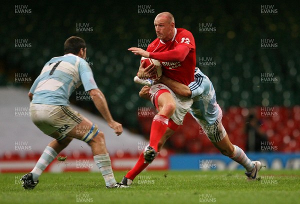 18.08.07  Wales v Argentina Wales Gareth Thomas is tackled by Federico Todeschini. 