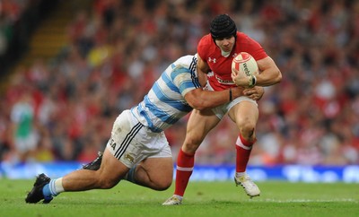 20.08.11 - Wales v Argentina - RWC Warm-Up Match - Leigh Halfpenny of Wales is tackled by Agustin Creevy of Argentina. 
