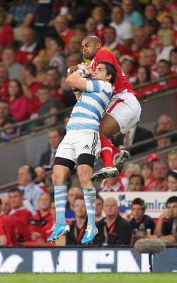 20.08.11 Wales v Argentina. Wales' Aled Brew and Argentina's Gonzalo Camacho. 