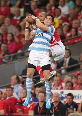 20.08.11 Wales v Argentina. Wales' Aled Brew and Argentina's Gonzalo Camacho. 