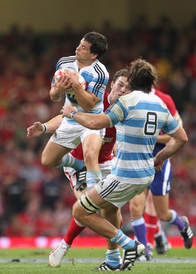 20.08.11 Wales v Argentina. Argentina's Nicolas Vergallo is tackled by George North. 
