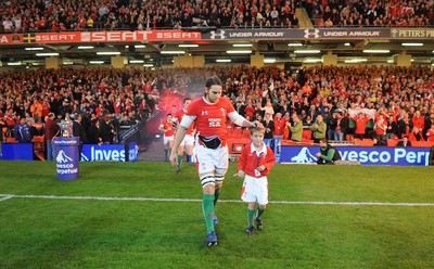 21.11.09 - Wales v Argentina - Invesco Perpetual Series 2009 - Wales captain Ryan Jones leads his team out with mascot Jonathan Hansford. 